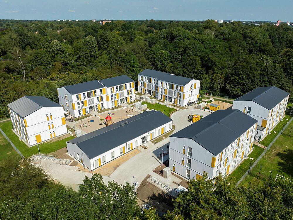 Luftbild der Unterkunft mit grauen Dächern 